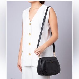 Marc Jacob’s Empire City cream crossbody purse